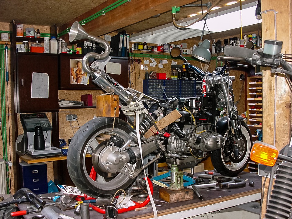 motorcycle prepped for storage in garage